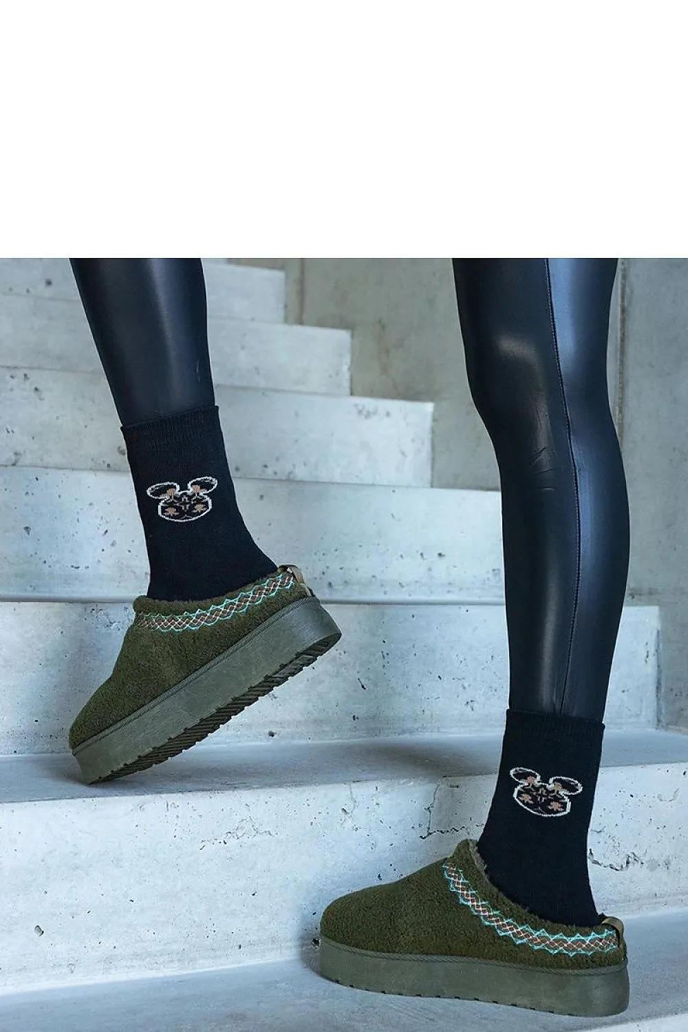Brown snow boots with a low shaft