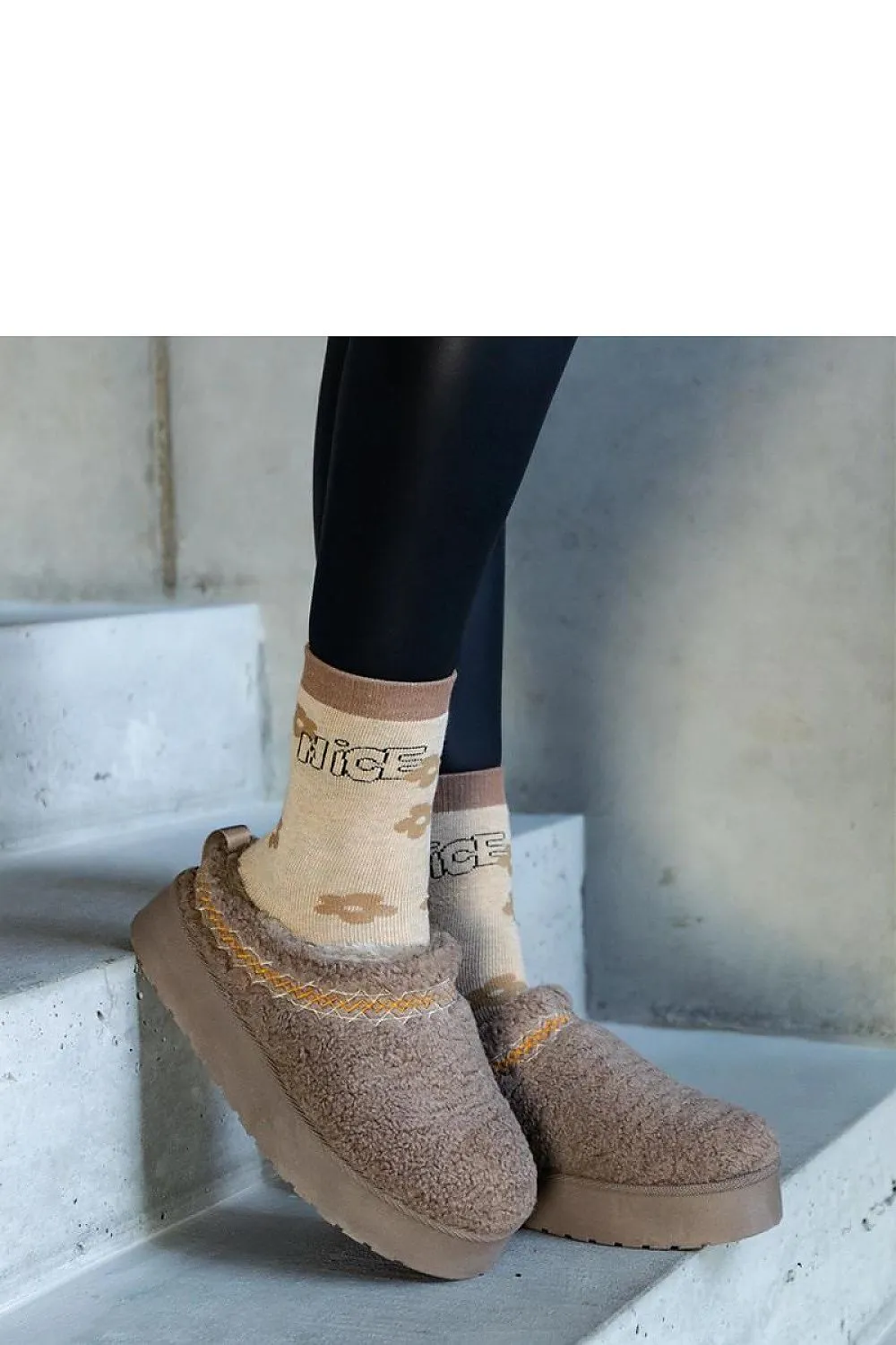 Brown snow boots with a low shaft