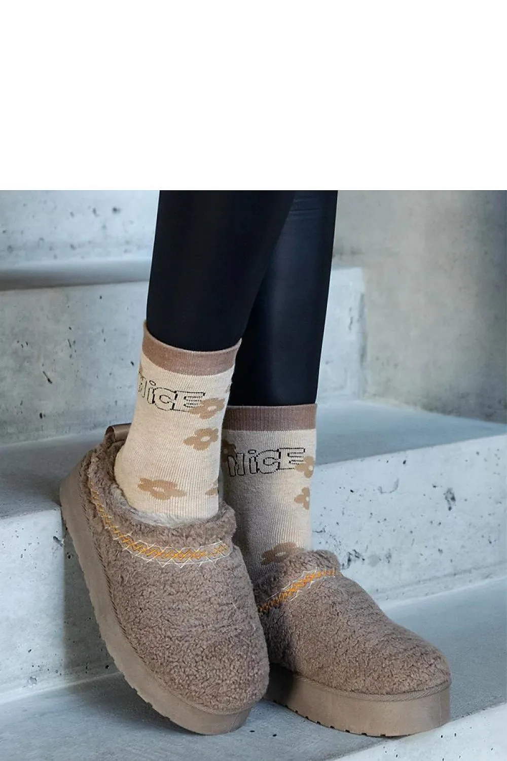 Brown snow boots with a low shaft