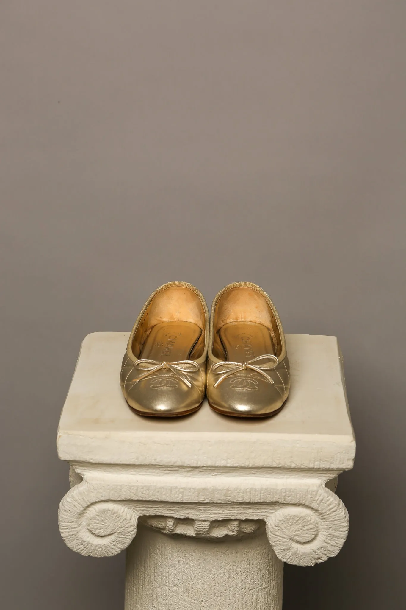 CHANEL Gold Ballet Flats
