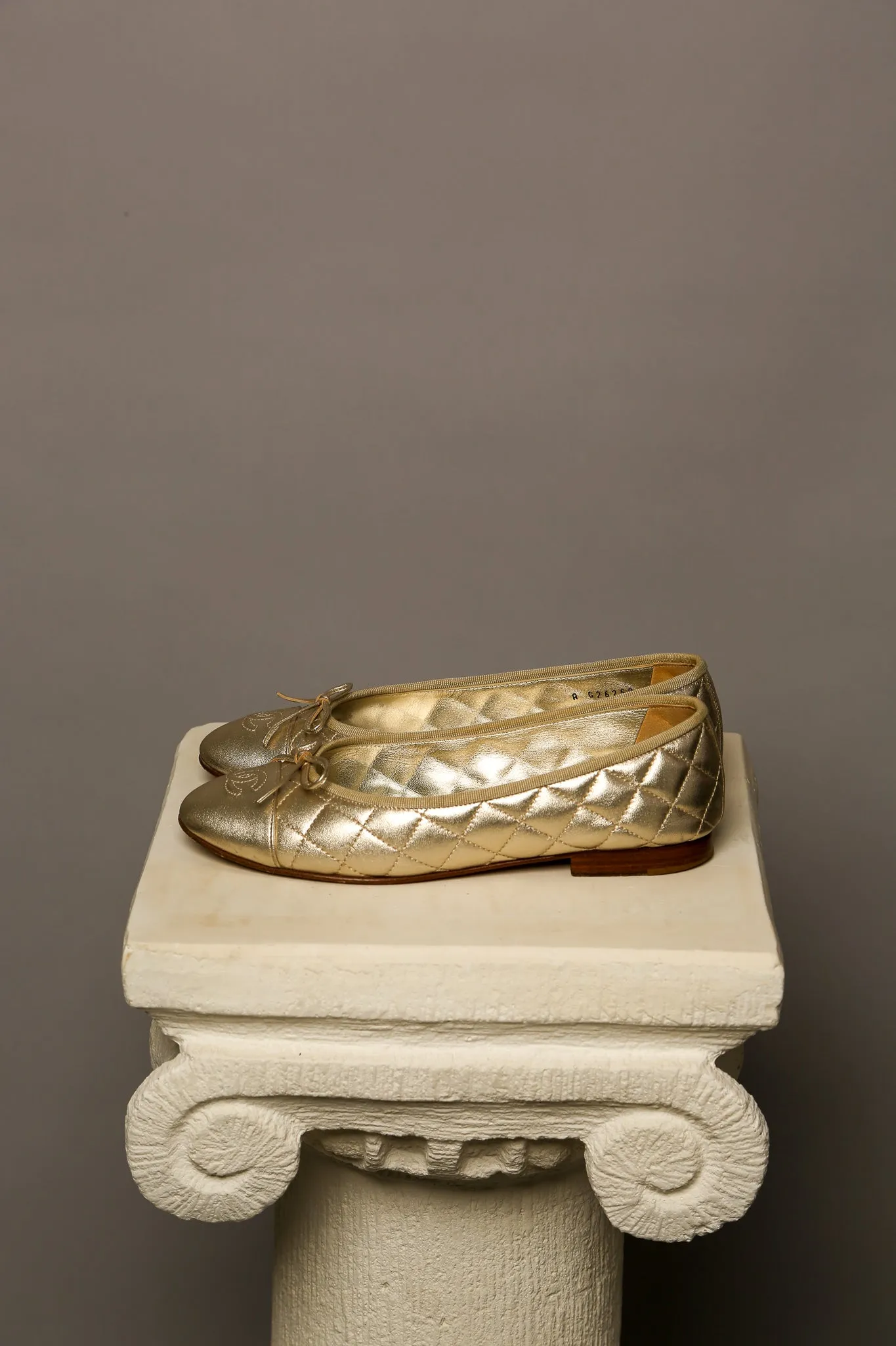 CHANEL Gold Ballet Flats
