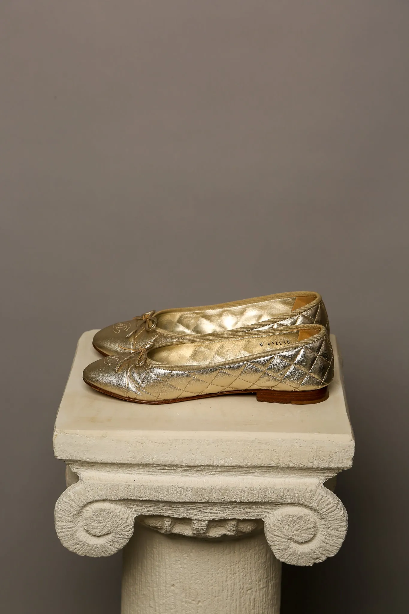 CHANEL Gold Ballet Flats