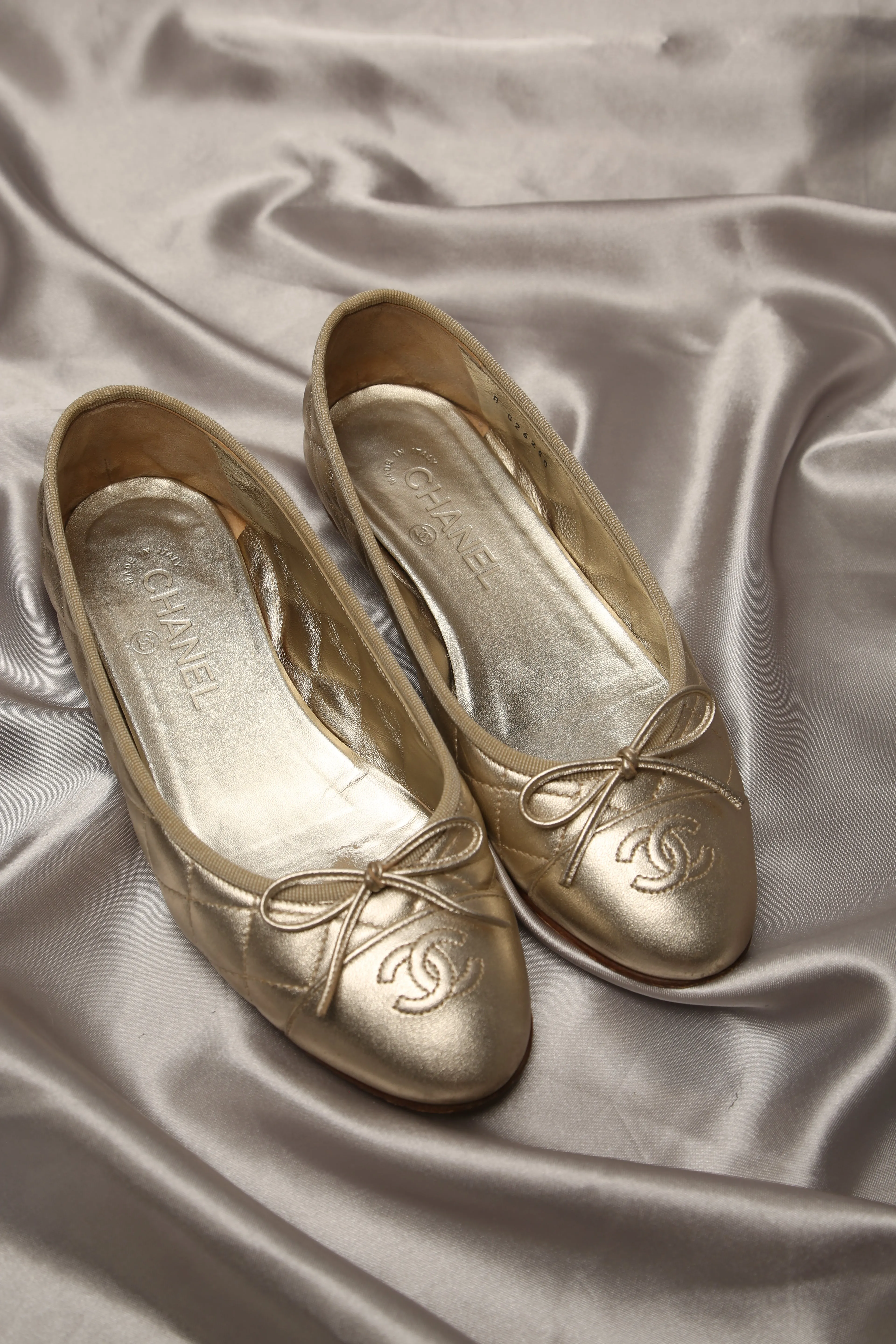 CHANEL Gold Ballet Flats