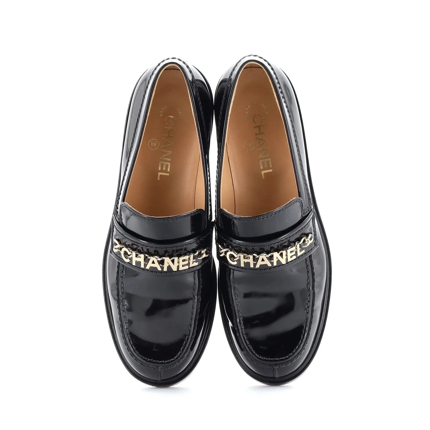 CHANEL SHINY PATENT CALFSKIN LOGO LOAFERS