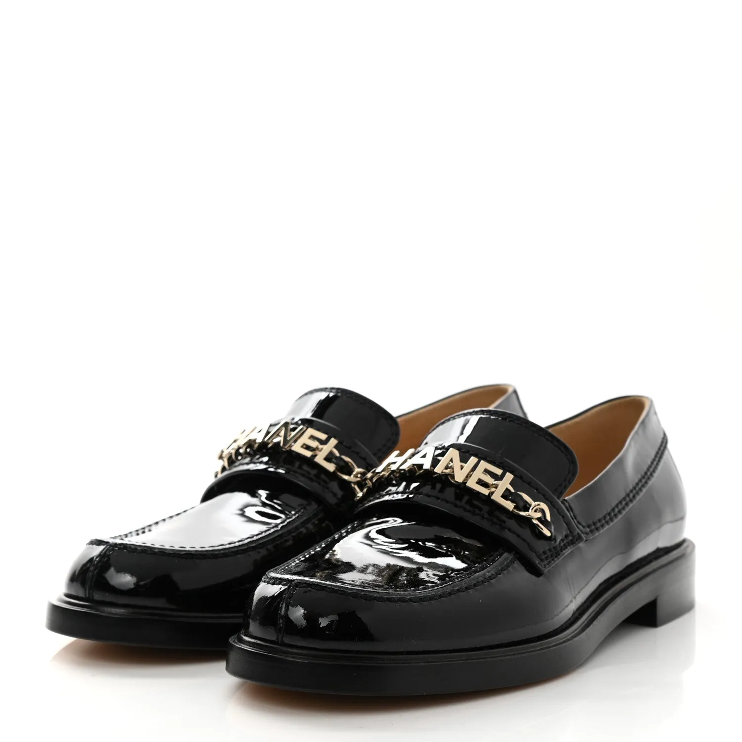 CHANEL SHINY PATENT CALFSKIN LOGO LOAFERS