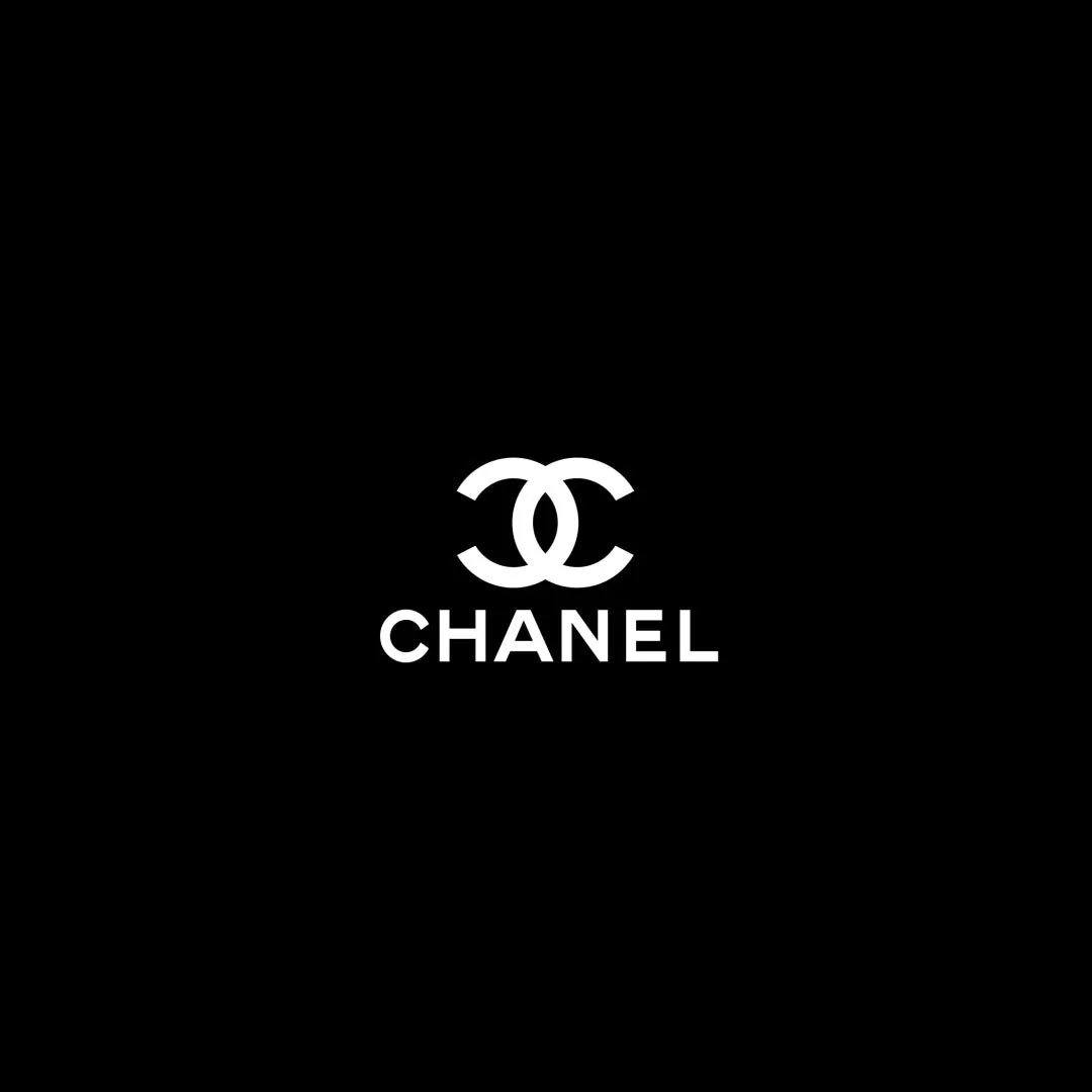 CHANEL SHINY PATENT CALFSKIN LOGO LOAFERS