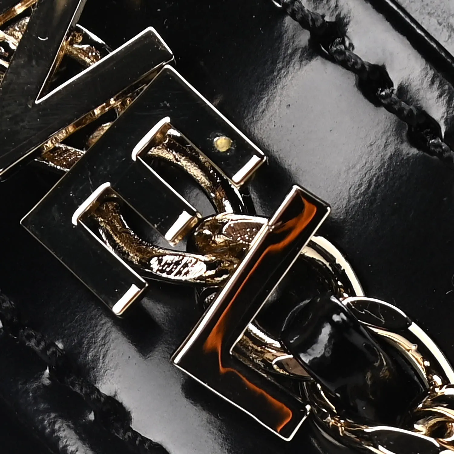CHANEL SHINY PATENT CALFSKIN LOGO LOAFERS