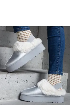 Silver platform snow boots adorned with fur